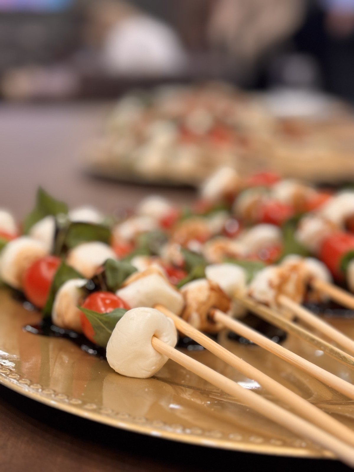 Caprese skewers on a tray
