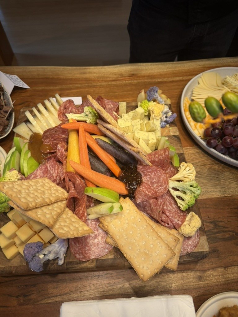 Charcuterie board with cured meats and vegetables