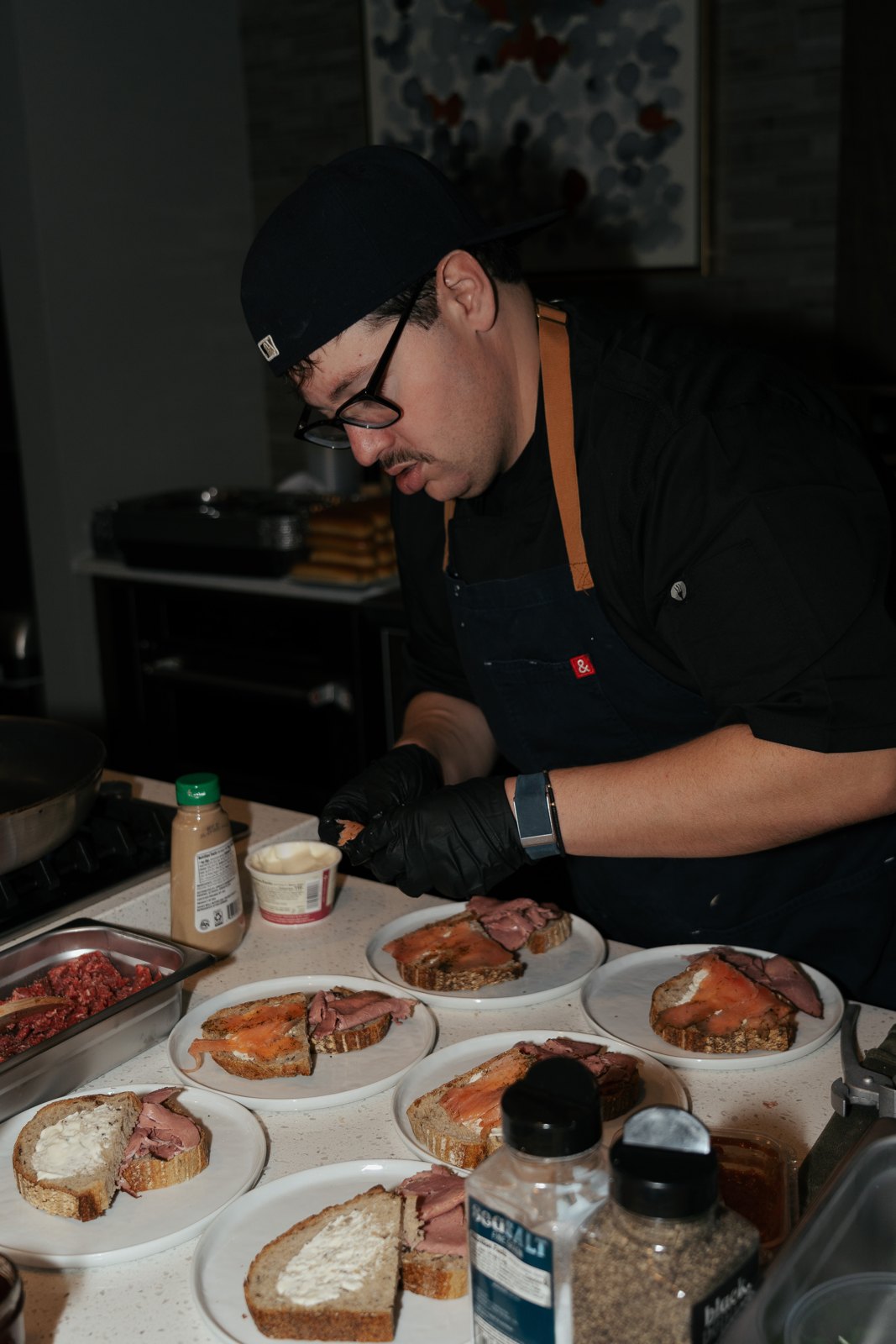 Chef plating courses at a private dinner