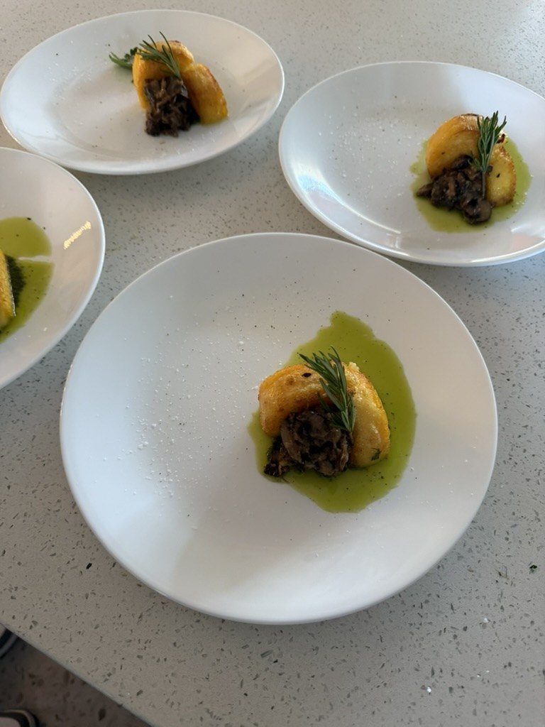 Fine-dining course on white porcelain