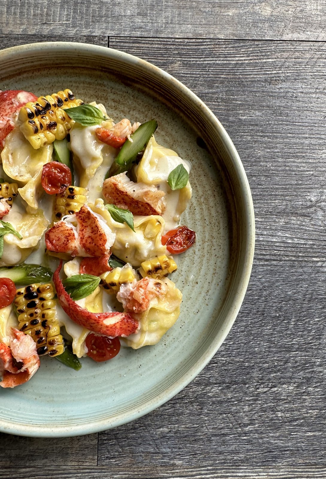 Plated heirloom tomato salad with grilled bread